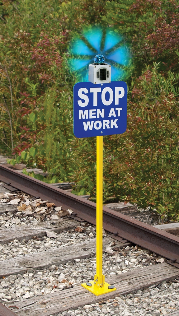 Lighted hinged spiked steel sign holder plate.  Includes hinged spiked steel sign holder, custom sign plate and solar light.  Blue, Red, Amber or Clear lens available.